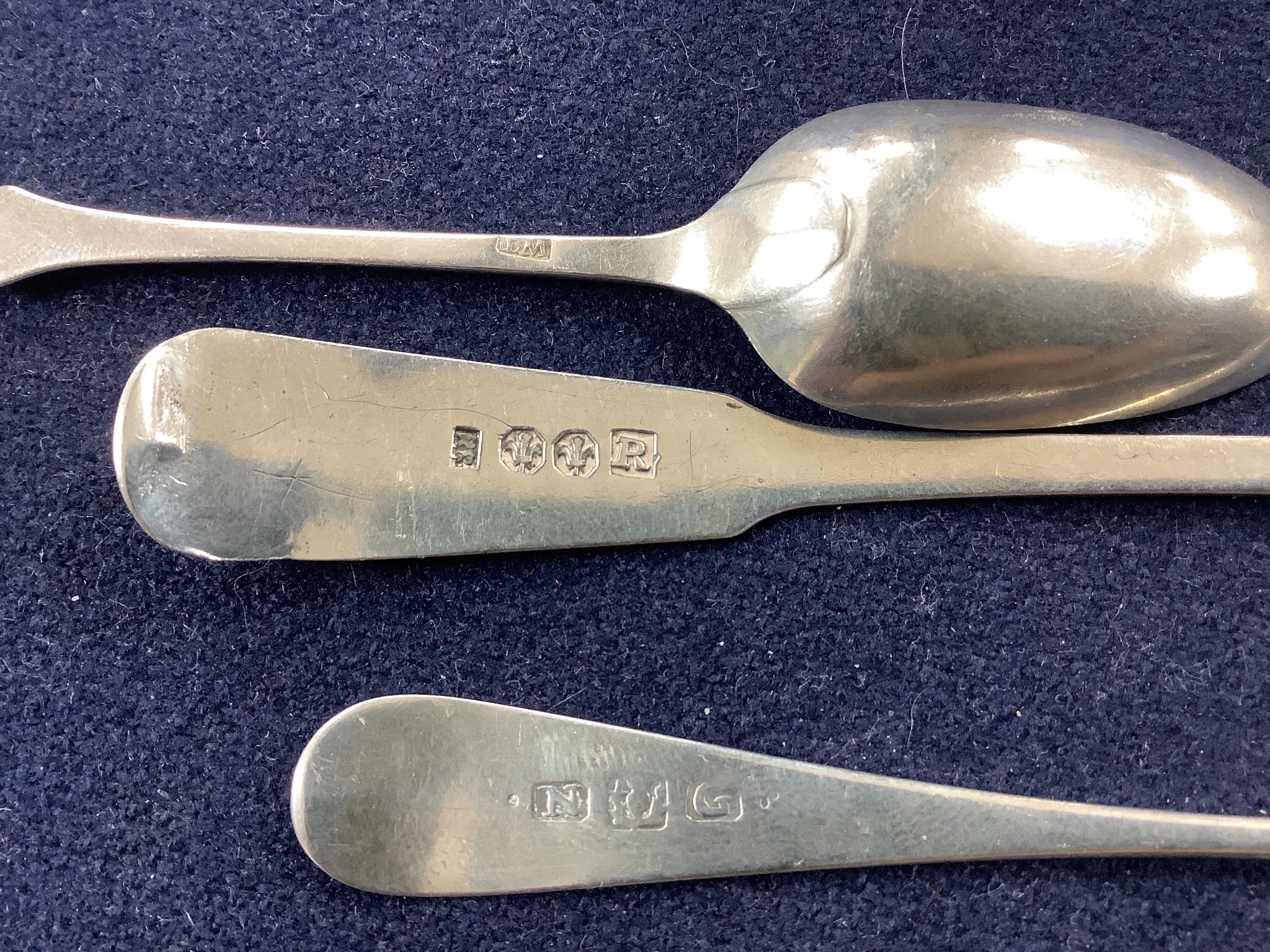 A19th century Scottish provincial silver fiddle pattern teaspoon, Robert Robertson, Cupar, c.1840, 15.1cm and two other smaller teaspoons, Nathaniel Gillert, Aberdeen, c.1800 and William Taylor, Edinburgh, c. 1770, gross